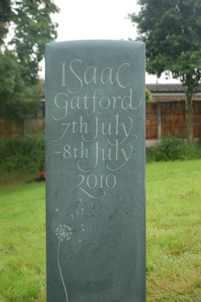 green slate headstone for a child