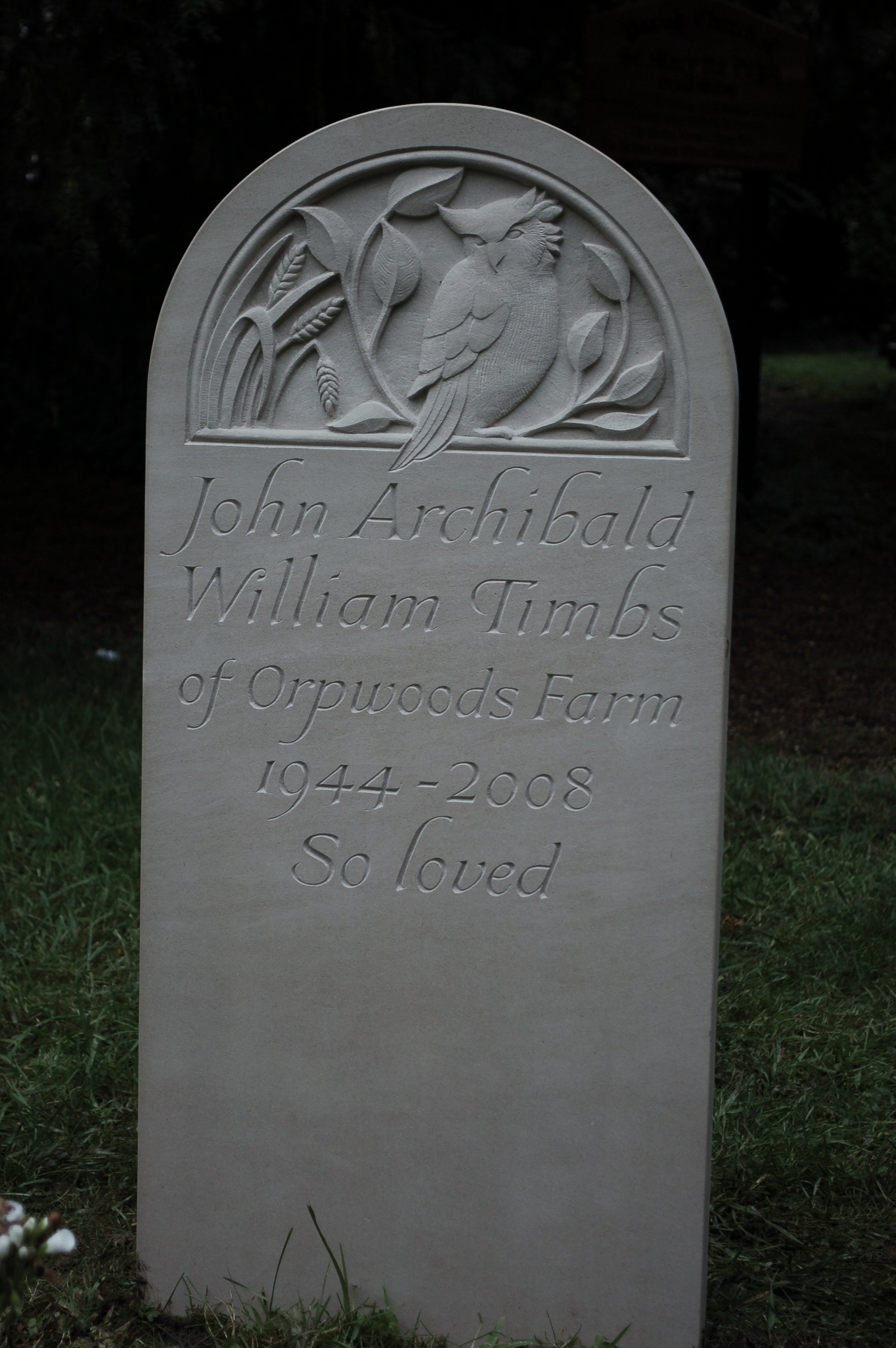 portland headstone with carving of owl